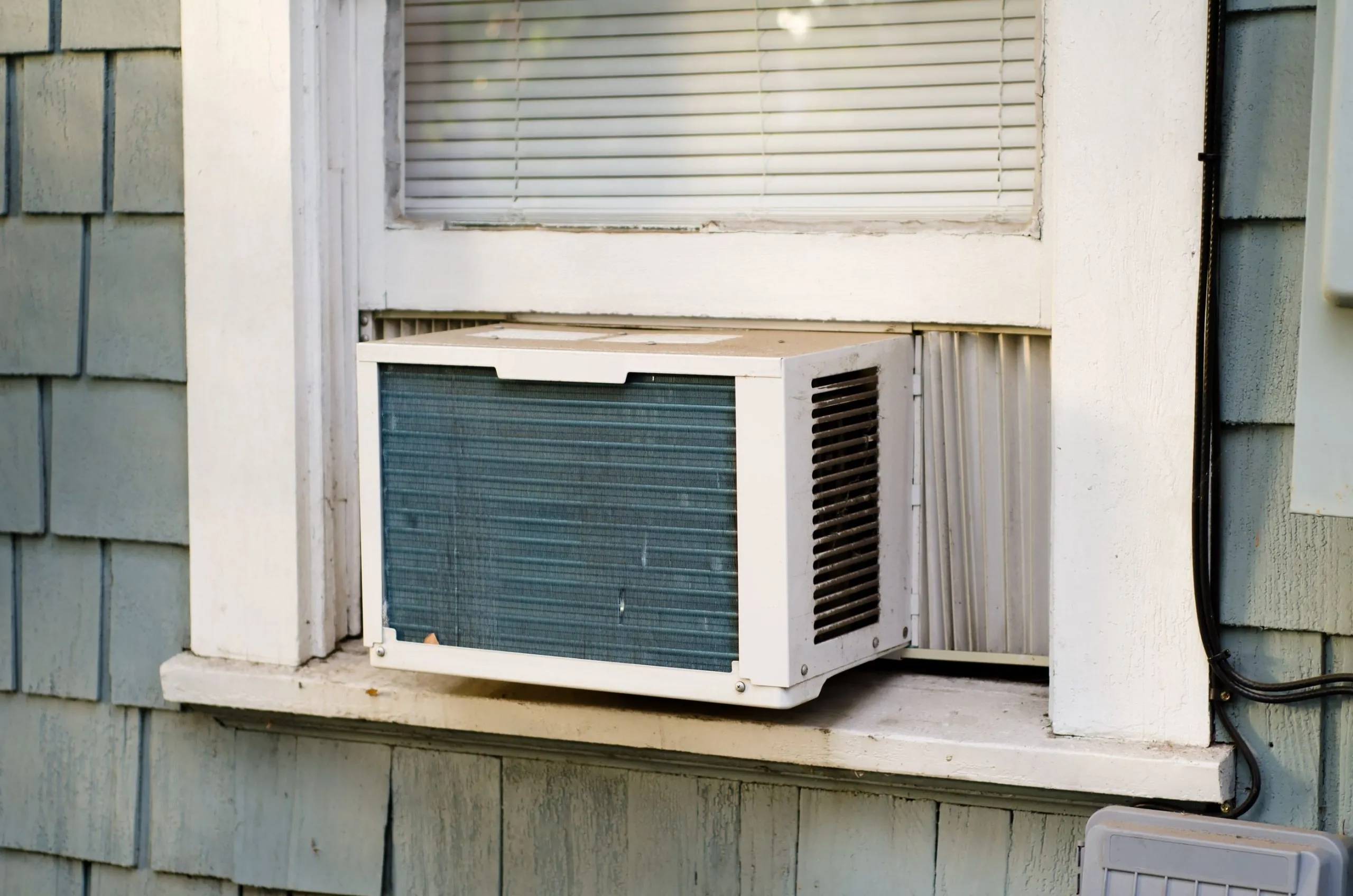 install-window-air-conditioner-GettyImages-185001395-9055d0b7ae494108abb3a8e4c7a7d921